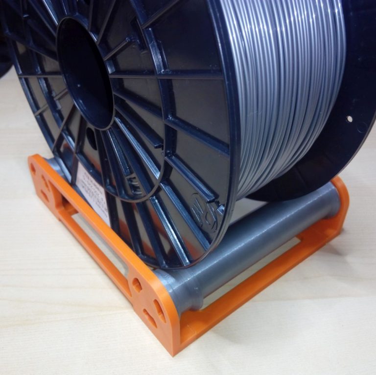 Csapágyas filament tartó